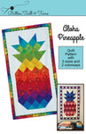 Cover photo of Aloha Pineapple quilt pattern showing the quilt in the rainbow and red, white and blue colorways